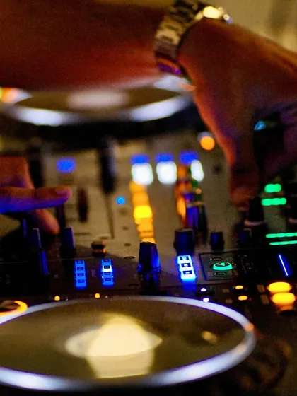 A close up view of my workspace. I use a professional Pioneer DJ setup to precisely mix tracks, control effects, and layer sounds to build the perfect set for any occasion.