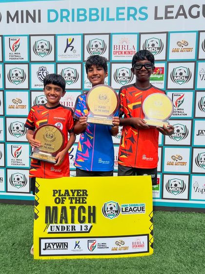 Celebrating individual achievements. Our players are recognized for their standout performances, receiving 'Player of the Match' awards during the Mini Dribblers League.