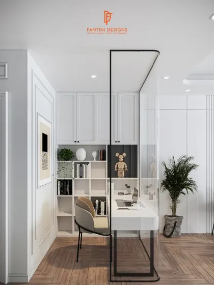 Another view of the home office, showing the built-in shelving and how it is cleverly sectioned off with a minimalist glass and metal frame.