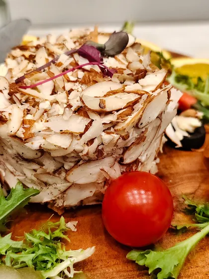A wheel of happiness, wrapped in nutty goodness. Our almond-crusted cheese is a centerpiece that is both rustic and refined.