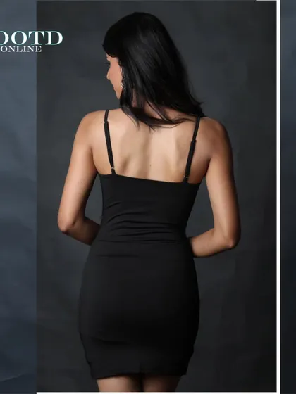A back view of the black bodycon dress, essential for e-commerce listings to show customers the full design and fit. The clean background keeps it professional.