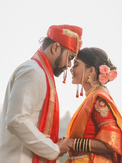 A quiet moment between Pratik and Madhuri on their wedding day. I believe the most powerful emotions are often unspoken. My goal with couple portraits is to capture this authentic connection, creating timeless Maharashtrian wedding photos you'll cherish forever.