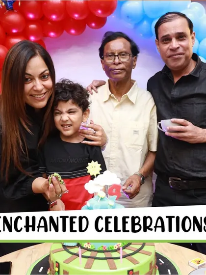 An enchanted celebration with a "Cars" themed cake. Here, the birthday boy is surrounded by his loving family for the cake-cutting ceremony.