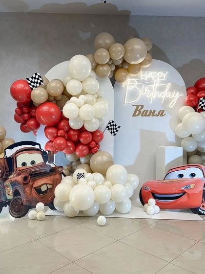 The full view of the stylish and modern Disney Cars birthday setup, perfect for a little racing fan.