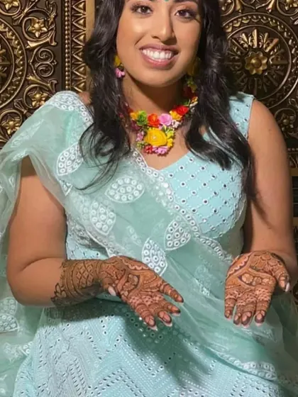 Seeing my clients happy is the best part of my job. This client looks radiant in a custom-made mint green Chikankari lehenga for her mehendi ceremony.