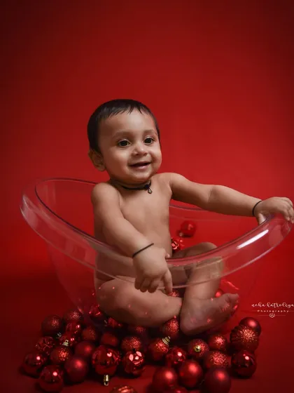 A beautiful, big smile from this little one. My goal during baby sessions is to engage with them and capture their genuine expressions of happiness.