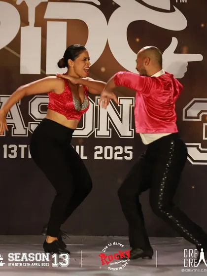 A moment of intense connection during our PIDC performance. Partner dancing is a conversation, and on stage, that conversation is for everyone to see.