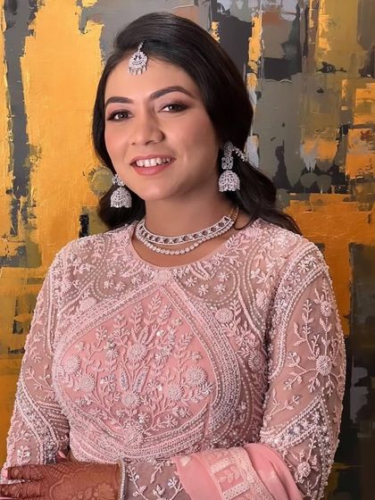 A beautiful engagement bride with her hair styled in soft, open waves. This elegant look is perfect for a formal ceremony, providing a touch of glamour without being overdone.