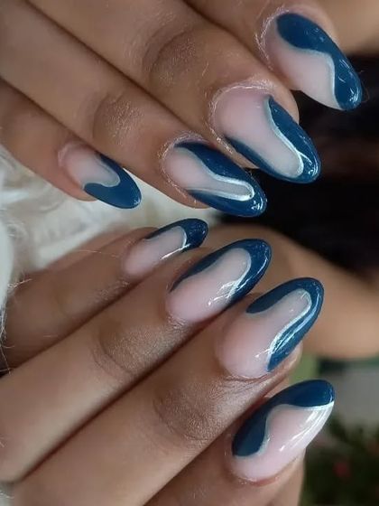 A moody and modern abstract design with deep blue swirls on a sheer base.