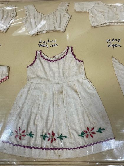 A miniature embroidered frock from my mother's 61-year-old journal. Her work has been preserved so well and continues to inspire me every day.