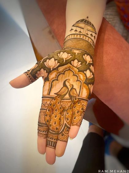 The finished version of the same palm design, now filled with intricate details and shading that make the motifs pop.