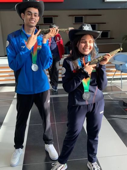 Indian shooters Hriday and Nancy celebrating their silver medals in the 10m Air Rifle event at the World Cup in Baku.