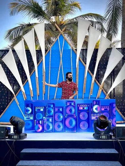 Here is a custom DJ console setup for a corporate sundowner party. I work with your event team to ensure my setup not only sounds incredible but also visually complements your event's theme and decor.