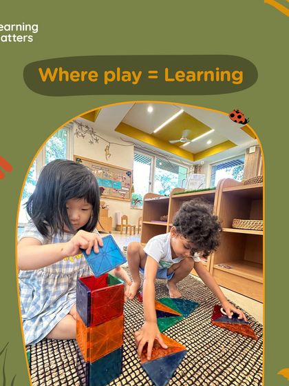 In our classrooms, play equals learning. We see every block tower and shared story as a step in development.