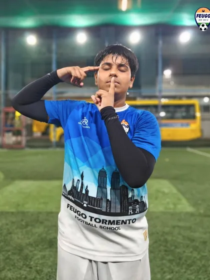 A player asks for silence, mimicking a famous goal celebration during a fun post-training activity.