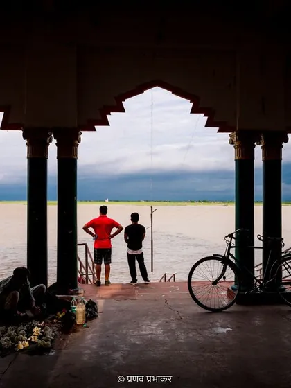 Photography for me is also about finding art in everyday life. This shot from a ghat in Bihar uses the archway to frame the scene, creating a powerful silhouette against the water. It reflects my photojournalistic eye for composition and storytelling.