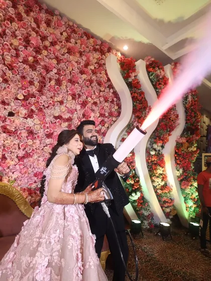 A fun and high-energy moment from an engagement party. The couple uses a CO2 smoke gun, adding a touch of modern fun and excitement to their celebration, and I was right there to capture their joyful expressions.