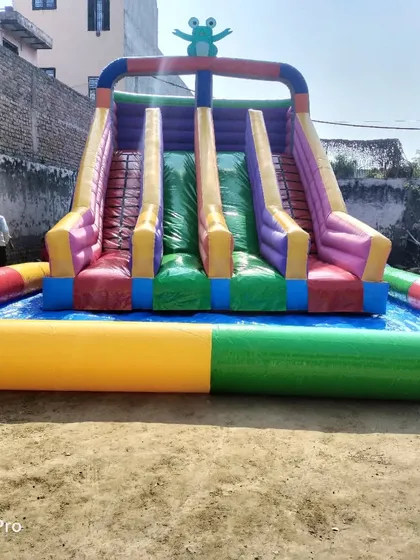 This is our inflatable water slide, designed with a large splash pool at the bottom. It's a fantastic addition for resorts, water parks, or summer events, made from water-resistant, commercial-grade PVC.