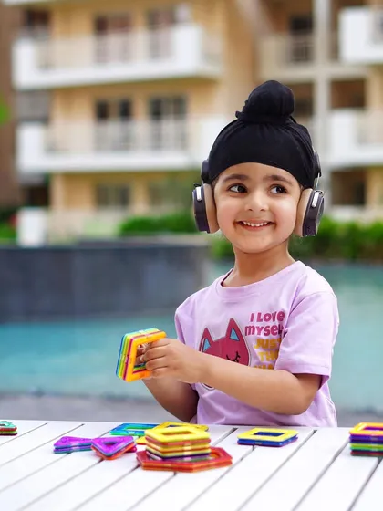 Capturing genuine joy in this kids' lifestyle shoot. The focus was on creating a playful, natural moment to showcase the headphones and t-shirt in a setting that feels both aspirational and real.
