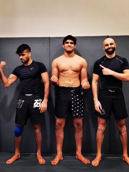 Another shot of Coach Raajus with the team. We believe in bringing in different experts to constantly expose our students to new styles and techniques, keeping our game sharp.