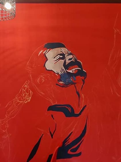 The RCB mural in its early stages. We started with the outlines and then began blocking in the main colors and features.