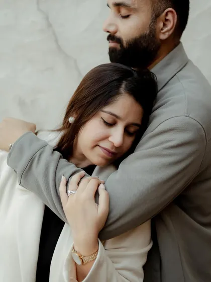 A tender embrace that speaks volumes. This close-up of Dolly and Dhairya during their Dubai shoot focuses on the quiet comfort and deep affection they share.