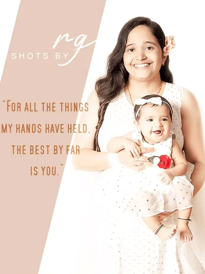 "For all the things my hands have held, the best by far is you." A beautiful portrait of a mother and her smiling baby girl.