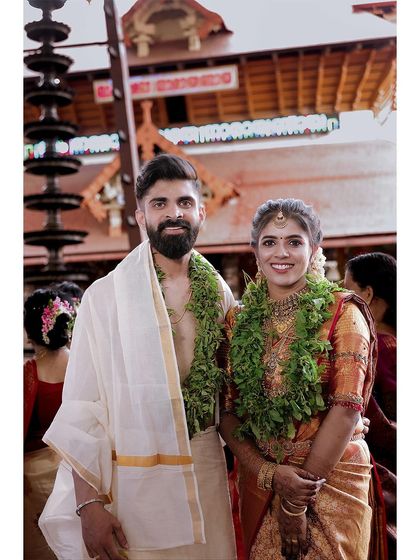 Orange Wedding Cinemas - Wedding Photography & Cinematography Timeless Kerala Traditions photo 92