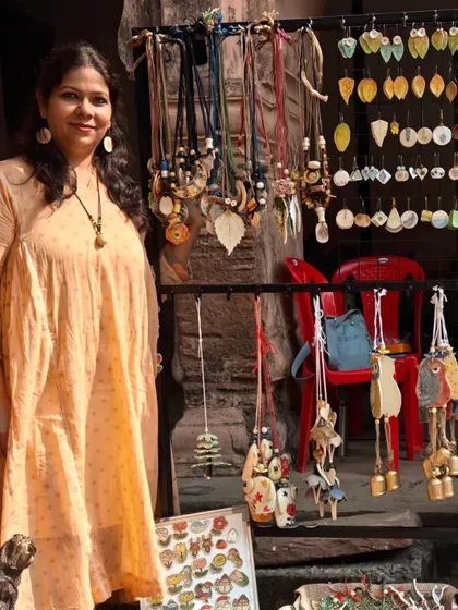 Here I am at a local potter's market, surrounded by my handmade ceramic jewellery. Each necklace and pair of earrings is a small piece of wearable art, designed to be unique and expressive. It's always a joy to connect with people who appreciate handcrafted work.