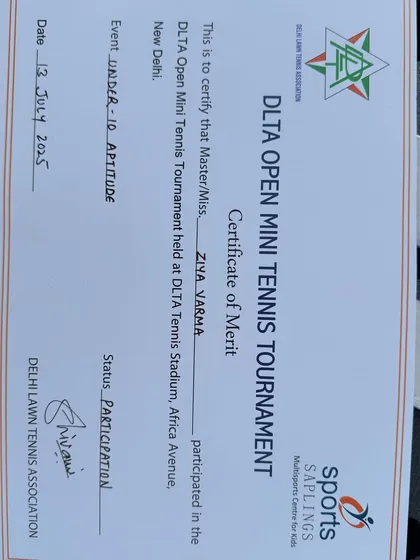 A close-up of Ziya Varma's Certificate of Merit for participating in the Under-10 event at the DLTA Open Mini Tennis Tournament. This marks the start of her competitive journey.