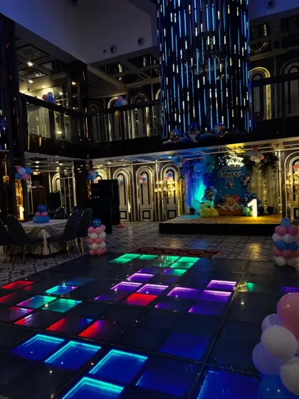 The Baby Shark theme in a large party hall with a dance floor, showing how I can scale decorations for any venue.
