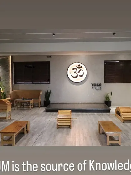 The serene setup of one of our training rooms, featuring various wooden props. This space is dedicated to the deep study and practice of yoga.