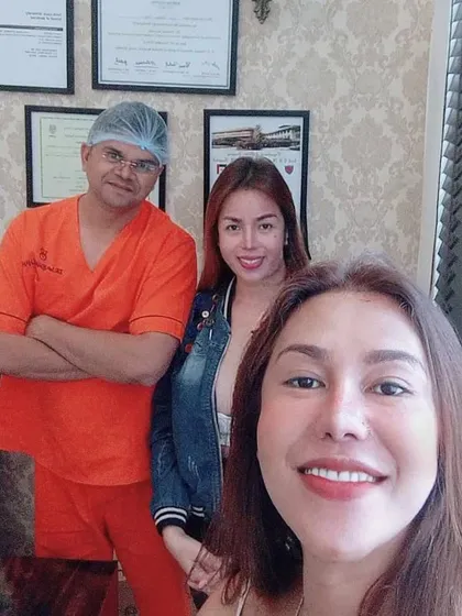 A selfie with happy patients. My team and I work hard to ensure every patient feels cared for and confident in their results.