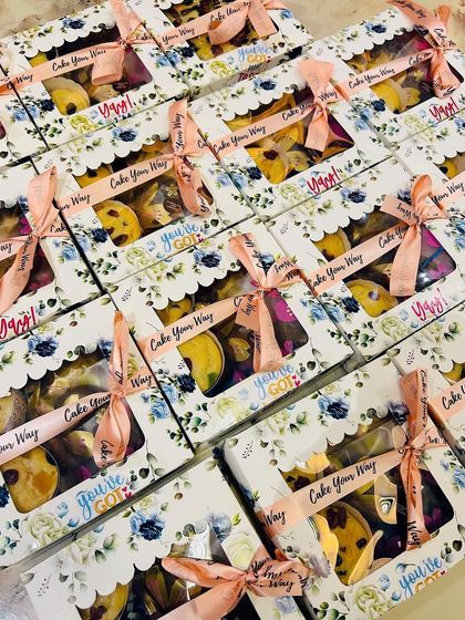 A large order of my floral-themed hamper boxes, all packed and tied with a custom ribbon. These make for beautiful and memorable return favors.