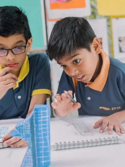 We believe in learning by doing. Here, students are deeply engaged in a hands-on project, showcasing the collaboration, focus, and excitement that are part of the daily experience at our school.