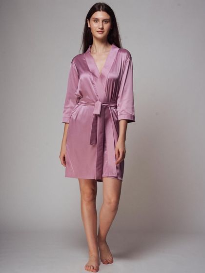 A clean and simple e-commerce style shot for a satin robe. The full-length view and neutral background provide a clear look at the product's fit and length.