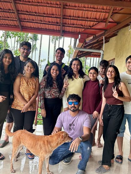 Our first batch of the season for the Bandaje trek, posing with a friendly local dog at our homestay.