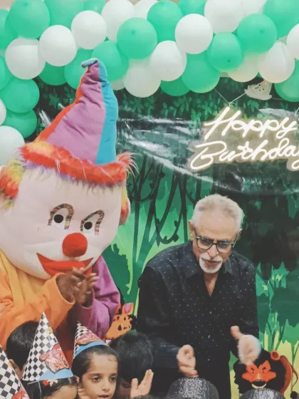 A great shot of the Joker mascot with the birthday boy's grandfather.