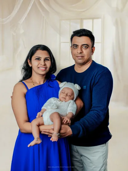 A picture-perfect family. I provide a clean, simple studio backdrop to create classic family portraits where your love for each other is the main focus.