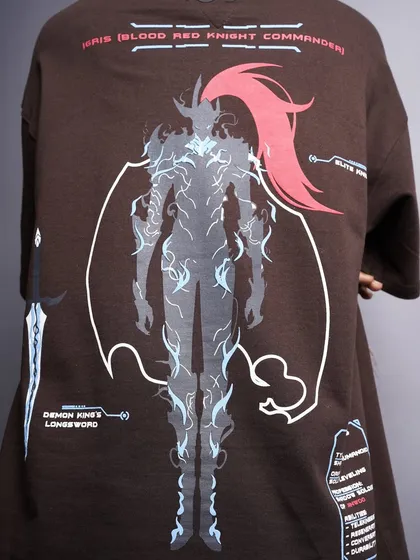 A detailed view of the impressive anime-style graphic on the back of a brown t-shirt. This image is designed to appeal to fans of graphic art and streetwear culture.