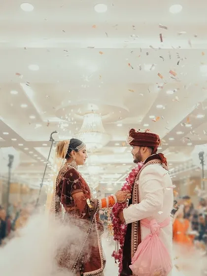 The Varmala is such a peak moment of the wedding. I love to make it feel as epic as it is, using effects like this cloud of smoke and confetti to create a truly cinematic and unforgettable memory of the couple's exchange.
