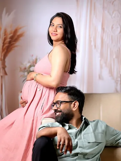 A relaxed and stylish portrait from a maternity session, using a boho-themed setup in our studio.