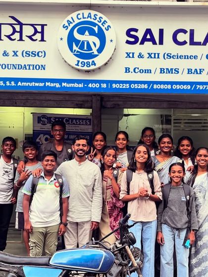 A group of students posing outside our classes on Grey day, showcasing their participation in the theme.