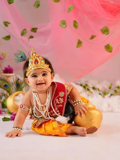 A wide-angle view of our happy little Krishna in his festive playground. The entire set is designed to create a vibrant and joyful atmosphere for Janmashtami portraits.