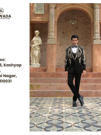 A full-length shot of the baroque tuxedo, displaying its impeccable tailoring and commanding silhouette. This is the ultimate statement piece for a formal event.