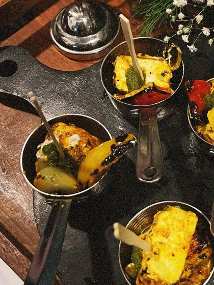 Our Paneer Tikka Skewers are marinated and grilled until perfectly charred. Served in mini pans with bell peppers, it's a classic Indian appetizer that we love making for all kinds of celebrations.