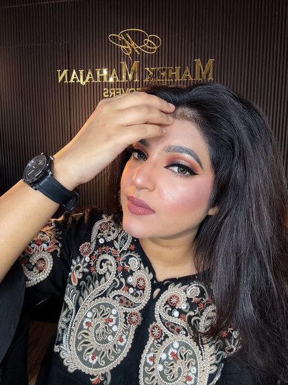 A confident pose, perfect for a professional headshot.