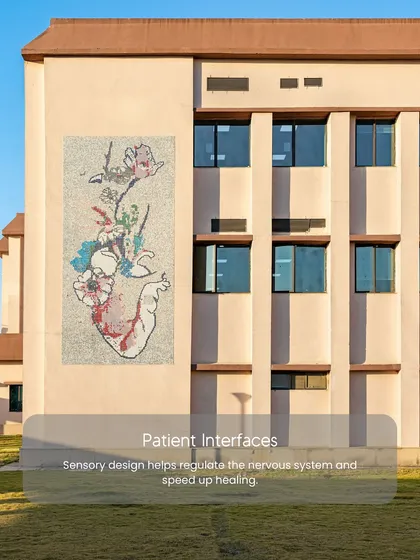 This image explains how sensory design in patient interfaces can help regulate the nervous system and speed up healing. The mosaic art on this building facade is an example of integrating art to enhance the patient experience.