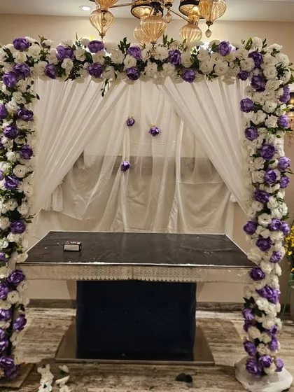 Make a statement with this luxurious floral mandap in a striking combination of white and royal purple. It's a sophisticated and modern choice for any festival.