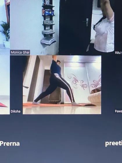 The energy of a group class is so powerful, even online. Here we are all in Virabhadrasana, or Warrior Pose, together. Seeing everyone on the screen, moving and breathing in sync, creates a beautiful sense of community and shared purpose.